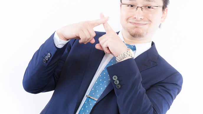 オッケーサインの笑顔の男性