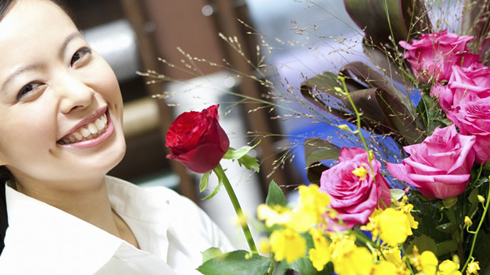 週４日のアルバイトに励む女性