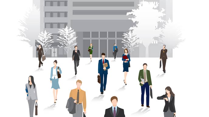 会社から一斉に帰宅する人々