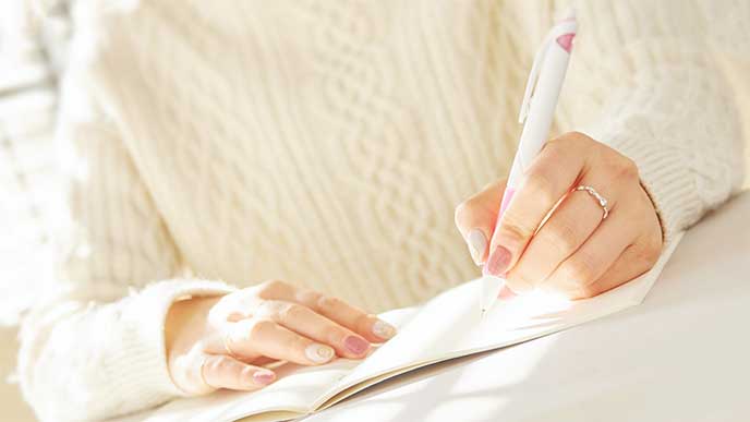 就活日記を書いてる女性