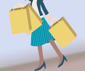 紙袋を数個持ち歩く女性